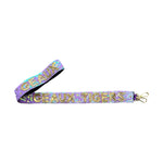 A sequined purple and iridescent strap featuring gold "GEAUX TIGERS" text, small gold star accents, and a gold lobster clasp