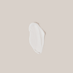 White cream smear on a beige background