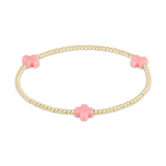 Gold beaded bracelet featuring tiny gold beads and three soft pink cross charms