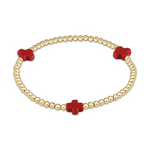 Gold beaded bracelet featuring three vibrant red cross-shaped charms