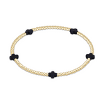 Gold beaded stretch bracelet with four black cross shaped beads