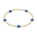 Gold beaded bracelet with five blue cross charms