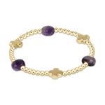 Gold beaded bracelet featuring three faceted dark purple amethyst beads and three polished gold cross charms