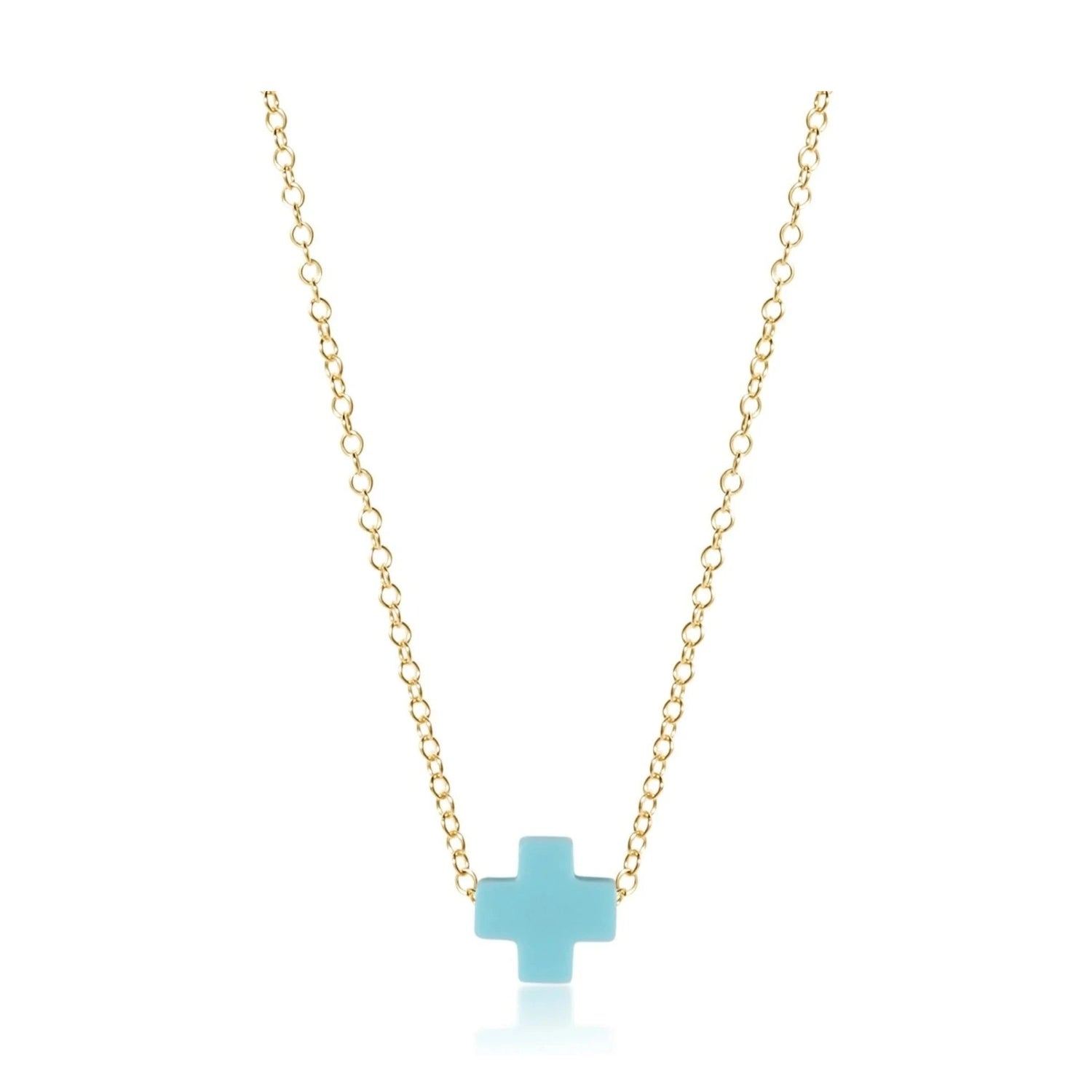 Minimalist gold chain necklace featuring a small light blue cross pendant centered on a white studio background