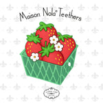 Maison Nola Teethers digital illustration features a bright red strawberry teether with yellow seeds in a green diamond lattice basket accented with small white flowers against a soft grey fleur-de-lis pattern background