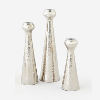 Set of three silver hammered metal tapered candle holders in assorted heights