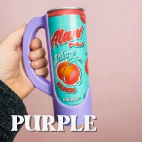A hand holds a vibrant purple can coozie containing a teal Alani Nu Juicy Peach Energy drink can against a soft pink background