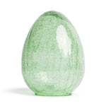 A light green translucent crackle glass egg-shaped decorative object