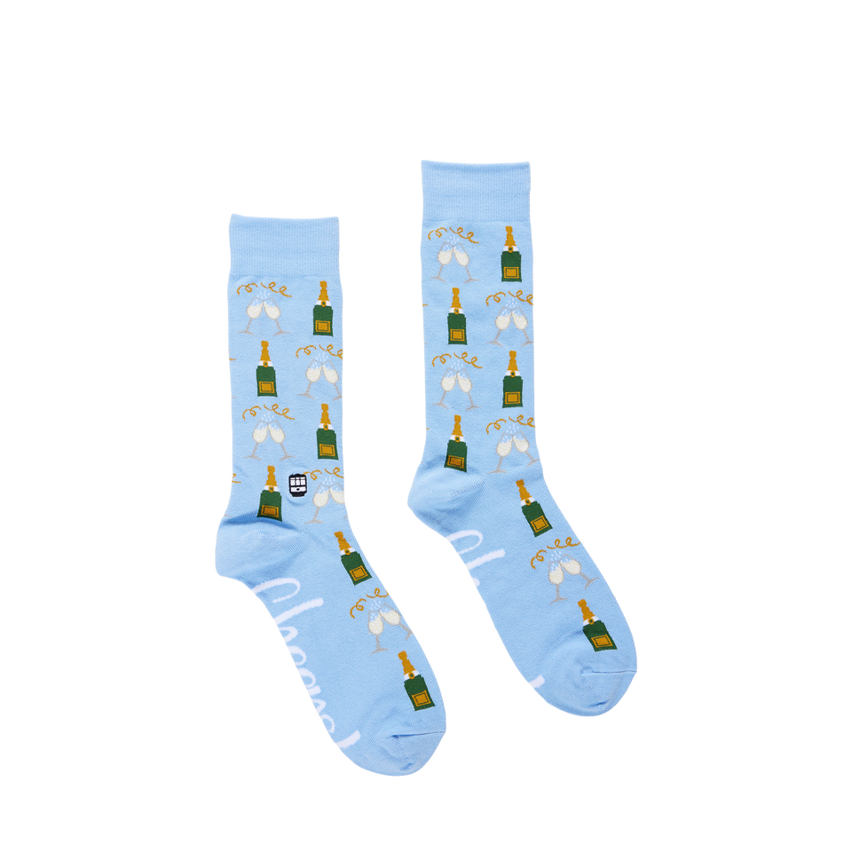 Light blue crew socks with champagne bottle and glass pattern