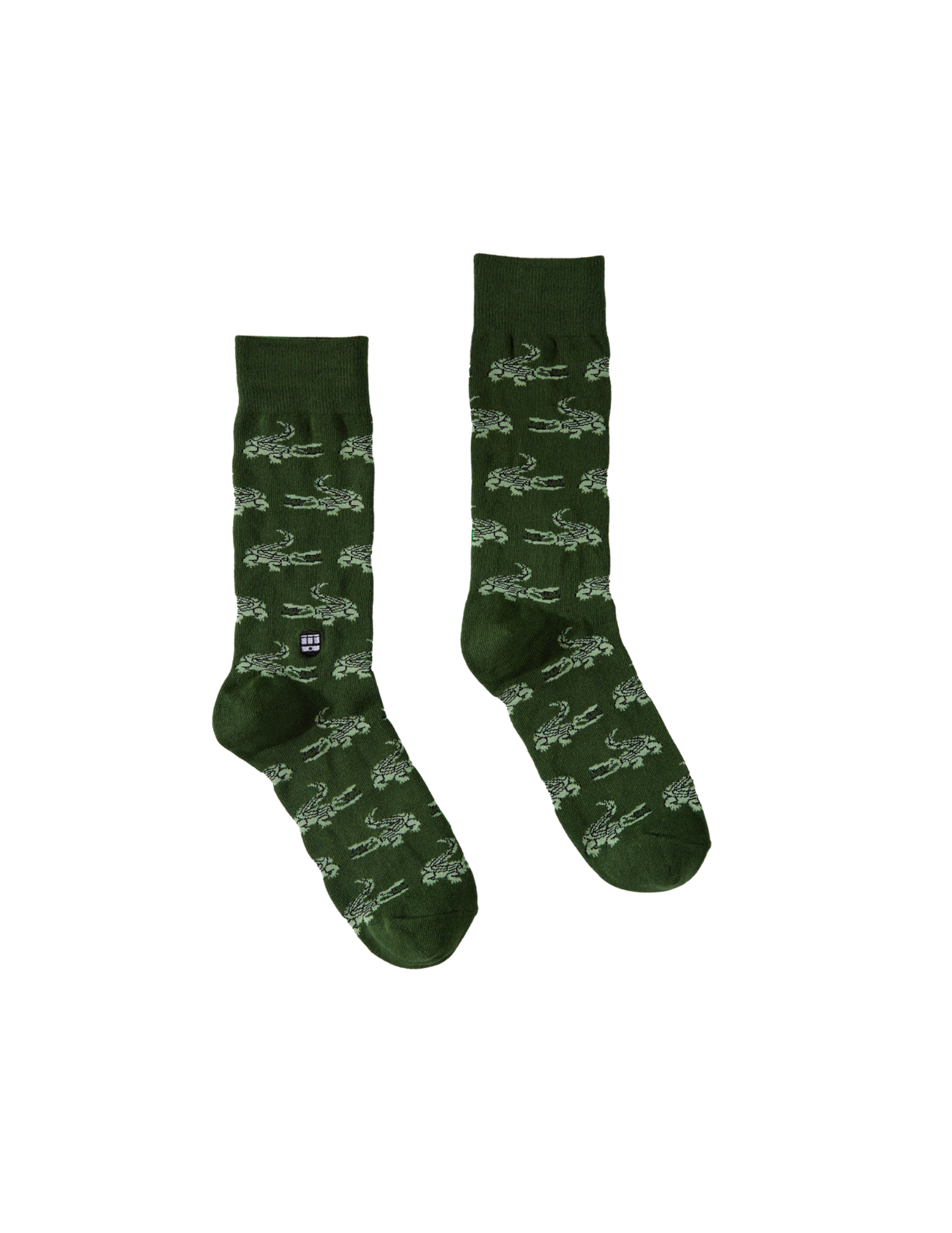 Pair of dark green crew socks with repeating light green crocodile pattern