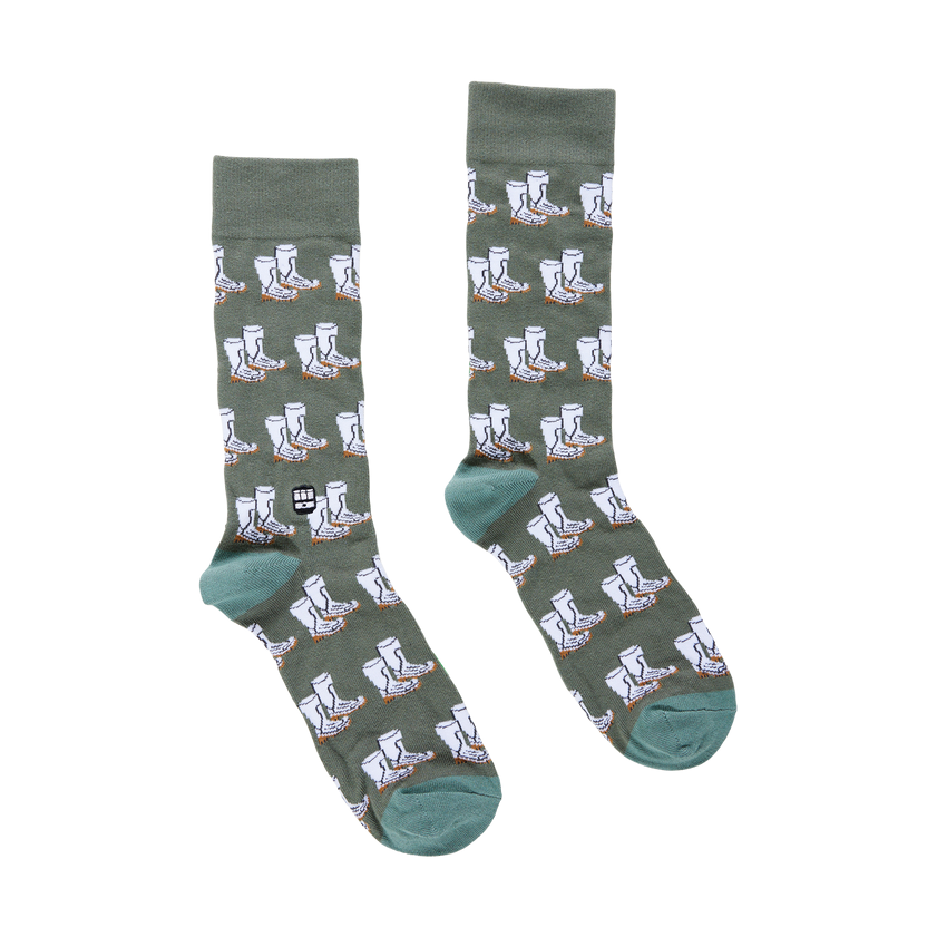 Green socks with boot pattern on a white background