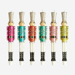 Six colorful nutcracker shaped taper candles