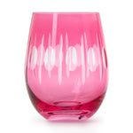 Pink crystal stemless glass featuring vibrant etched vertical lines and circular patterns