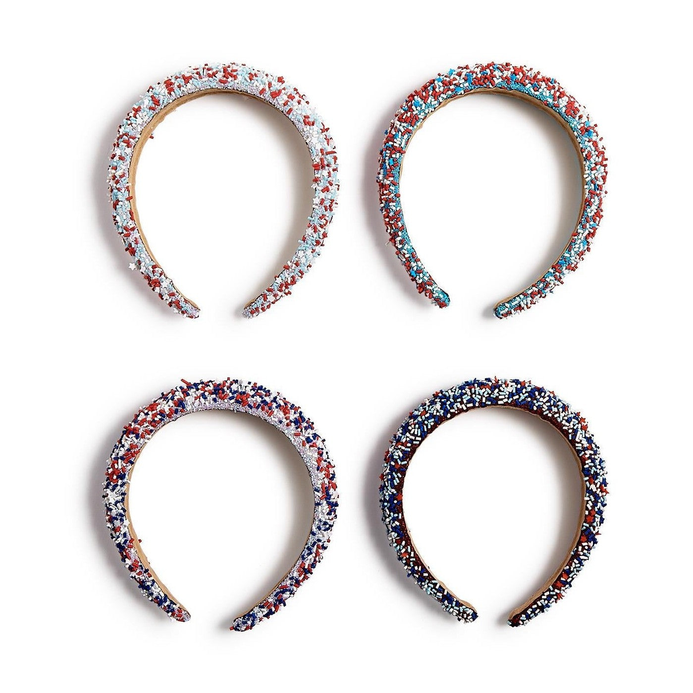 Four distinct headbands featuring varying patterns of red white and blue sprinkles including star shapes