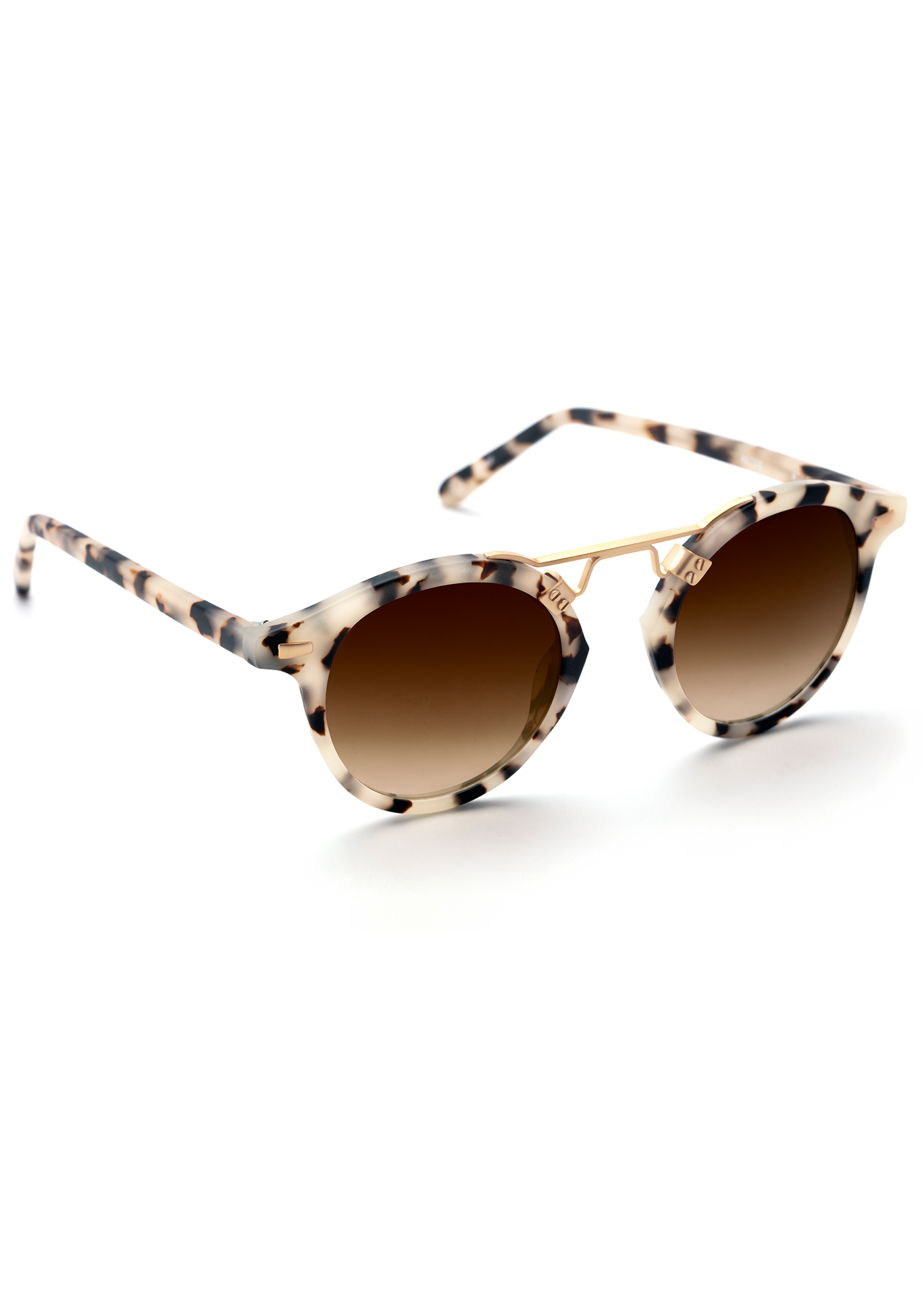 Pair of stylish sunglasses featuring white and black tortoise shell frames, a gold double bridge, and brown gradient lenses on a clean white background