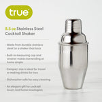 True's product photo of an 8.5 oz Stainless Steel Cocktail Shaker with a sleek silver finish featuring a built-in measuring cap and strainer and a prominent bright lime green logo