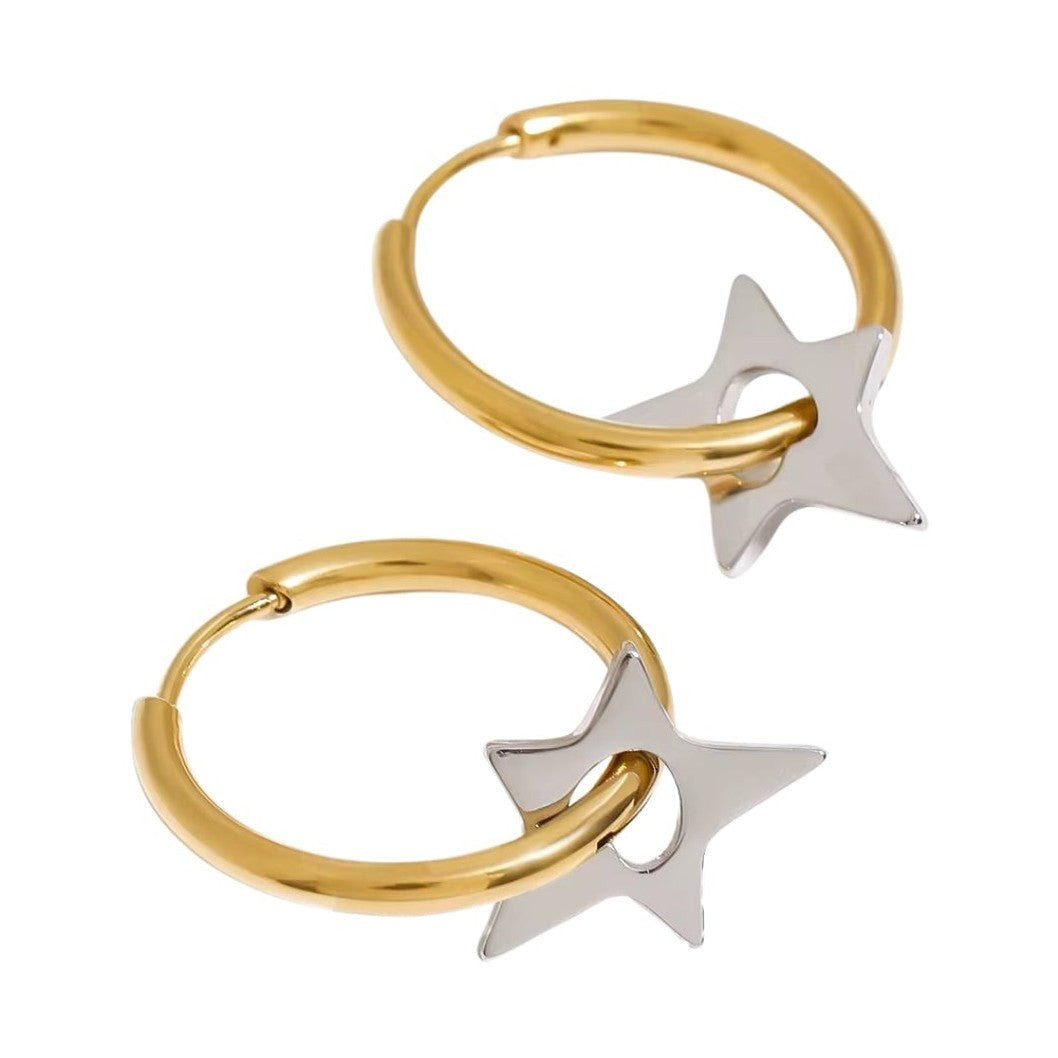 Bicolor gold-tone hoop earrings with dangling silver-tone star charms