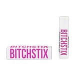 Commercial product photograph by BITCHSTIX of Strawberry Dragon Fruit lip balm and its white rectangular box featuring bold magenta-pink typography and SPF 30 labeling against a neutral white background