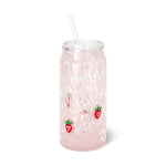 Hand-blown glass pink marbled can-shaped tumbler featuring red strawberry appliques with white seeds and green leaves, complete with a clear glass lid and straw on a white background
