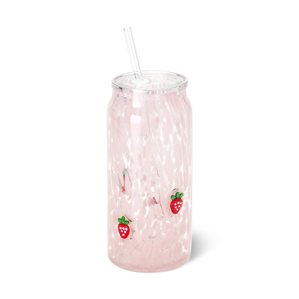 Hand-blown glass pink marbled can-shaped tumbler featuring red strawberry appliques with white seeds and green leaves, complete with a clear glass lid and straw on a white background