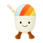 Plush toy shaped like a happy shaved ice drink with a vibrant rainbow-striped top a cream-colored cup body featuring a stitched smiling face and black dot eyes small brown feet and a striped straw
