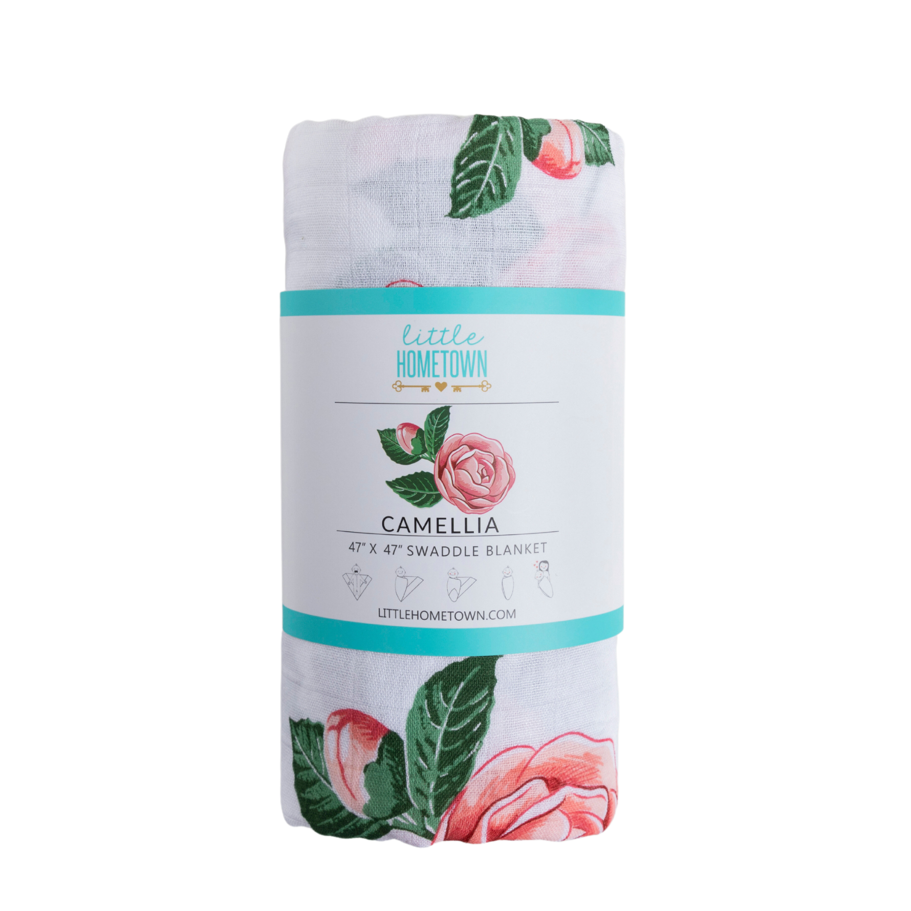 Rolled white swaddle blanket with pink camellia flower print and Little Hometown brand label