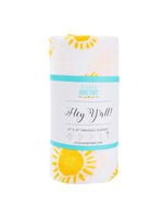 Rolled white swaddle blanket with yellow sun pattern and Little Hometown brand packaging