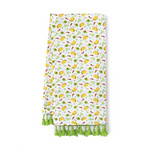 White textile kitchen towel featuring a vibrant repeating pattern of yellow tacos green avocado halves red chili peppers and margarita glasses with bright green tassels