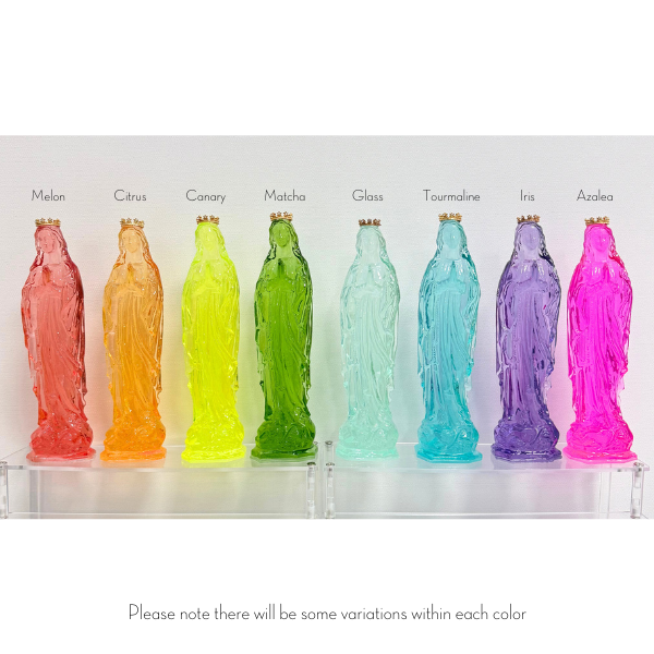 Eight translucent glass statues of the Virgin Mary in various colors labeled Melon Citrus Canary Matcha Glass Tourmaline Iris Azalea