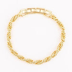 Gold bracelet featuring a twisted rope chain design and a rectangular box clasp with tiny embossed square patterns