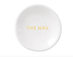 White ceramic round trinket dish with bold gold metallic lettering spelling THE MRS for a bridal gift or wedding keepsake