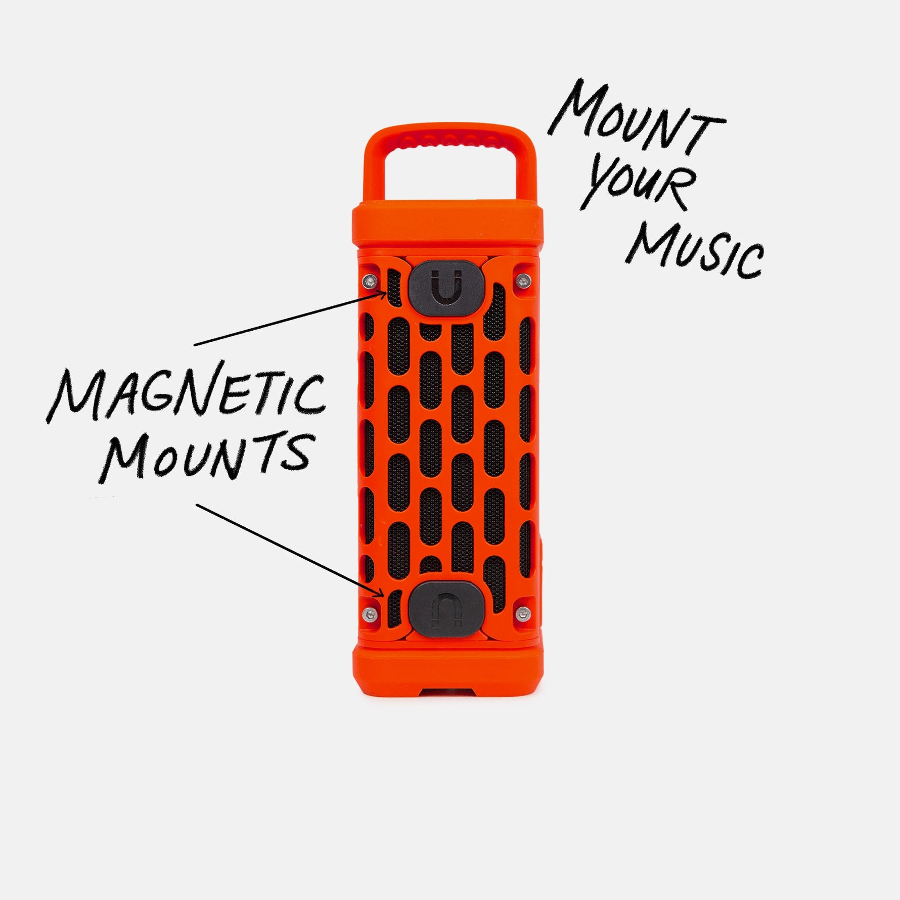 Product photograph of a vibrant orange cylindrical portable speaker with a top handle, black mesh grilles, and two black horseshoe magnet-shaped magnetic mounts, with overlay text promoting mounting music and magnetic features on a white background