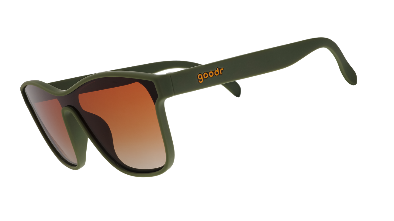 goodr sunglasses with a matte olive green frame orange-brown gradient lenses and an orange goodr logo on the temple