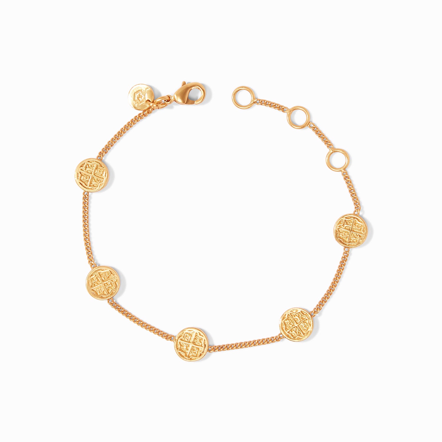 Gold chain bracelet featuring five circular coin charms with embossed cross designs
