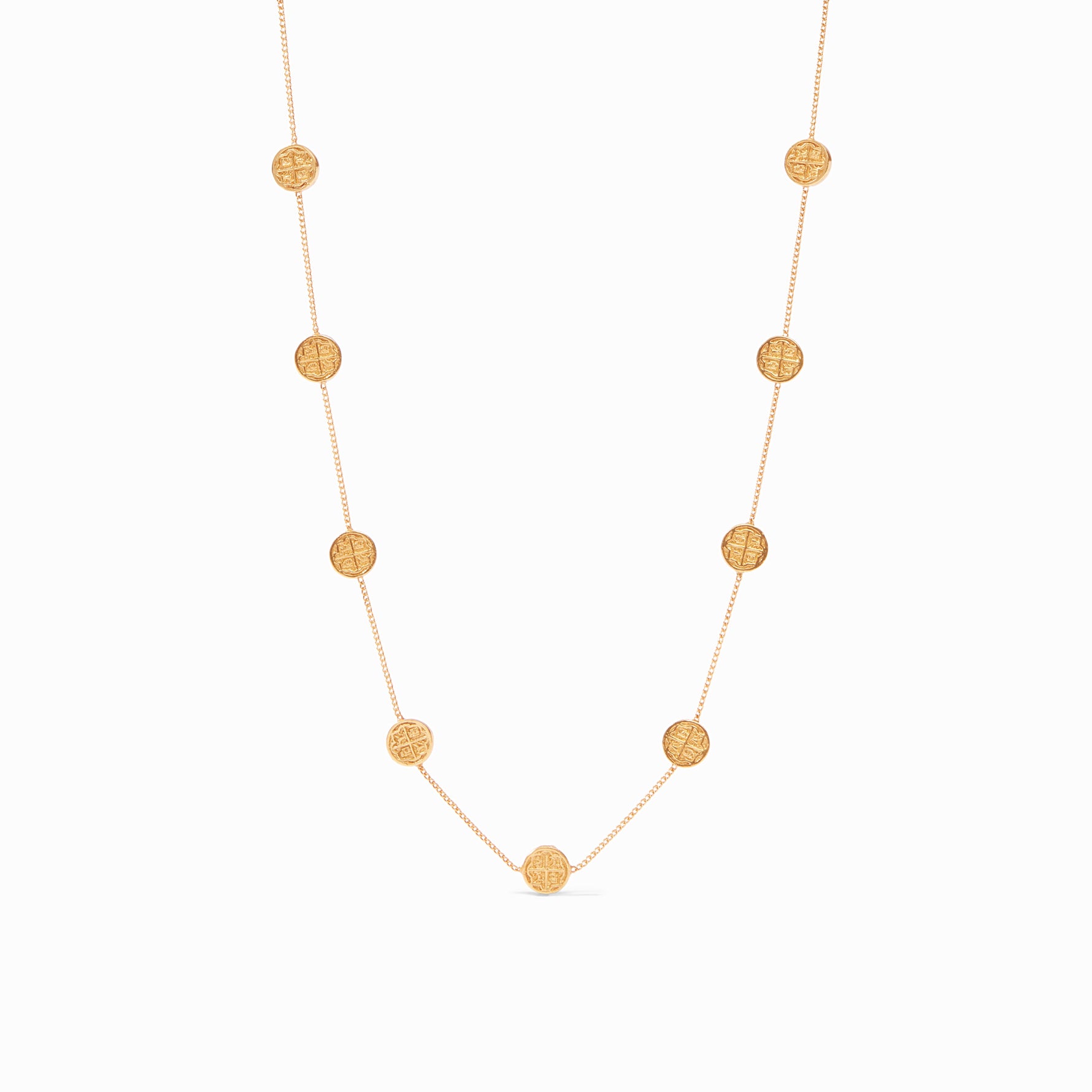 Gold chain necklace featuring evenly spaced circular coin charms with embossed cross designs