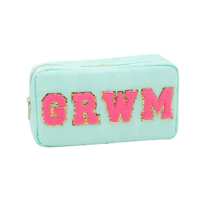 Mint green quilted cosmetic pouch bag featuring hot pink chenille letters GRWM with sparkling gold glitter outlines and a gold zipper