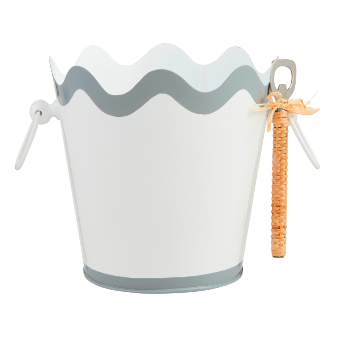 White metal ice bucket with scalloped grey rim and attached wicker handled bottle opener