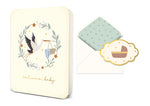 Welcome baby greeting card with stork illustration and matching envelope with star pattern