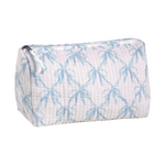 White quilted cosmetic bag featuring a repeating light blue palm tree pattern and a zippered closure with a white fabric tassel pull