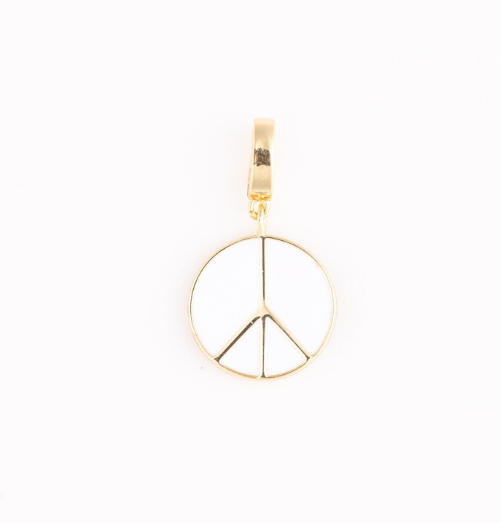 Gold tone peace sign charm with white enamel, a round shape, and a top clip bail