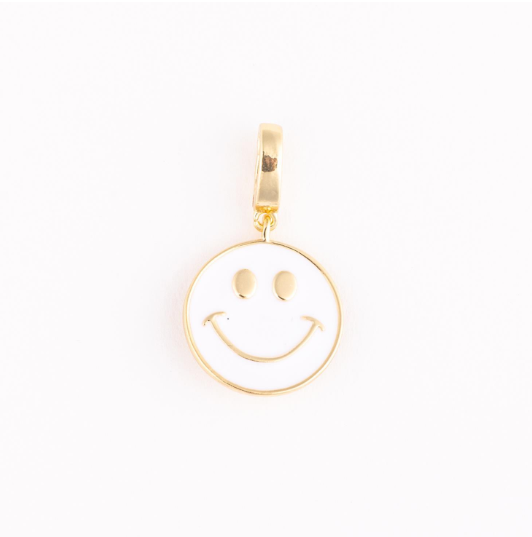 Gold-toned metal and white enamel circular smiley face charm with gold eyes and upturned mouth detail