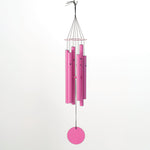 Bright fuchsia metal wind chime with five tubes, a top ring, and a circular clapper suspended by black strings