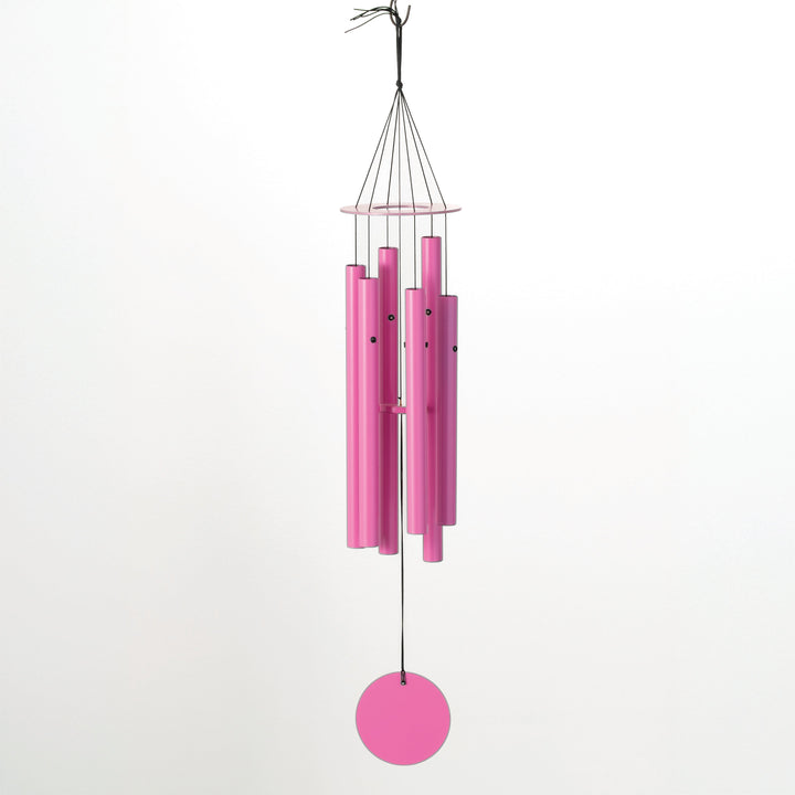 Bright fuchsia metal wind chime with five tubes, a top ring, and a circular clapper suspended by black strings