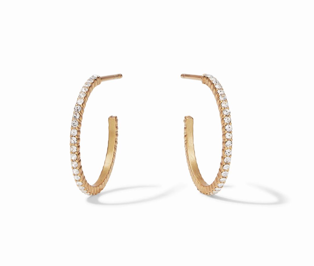 Gold hoop earrings with embedded clear crystals