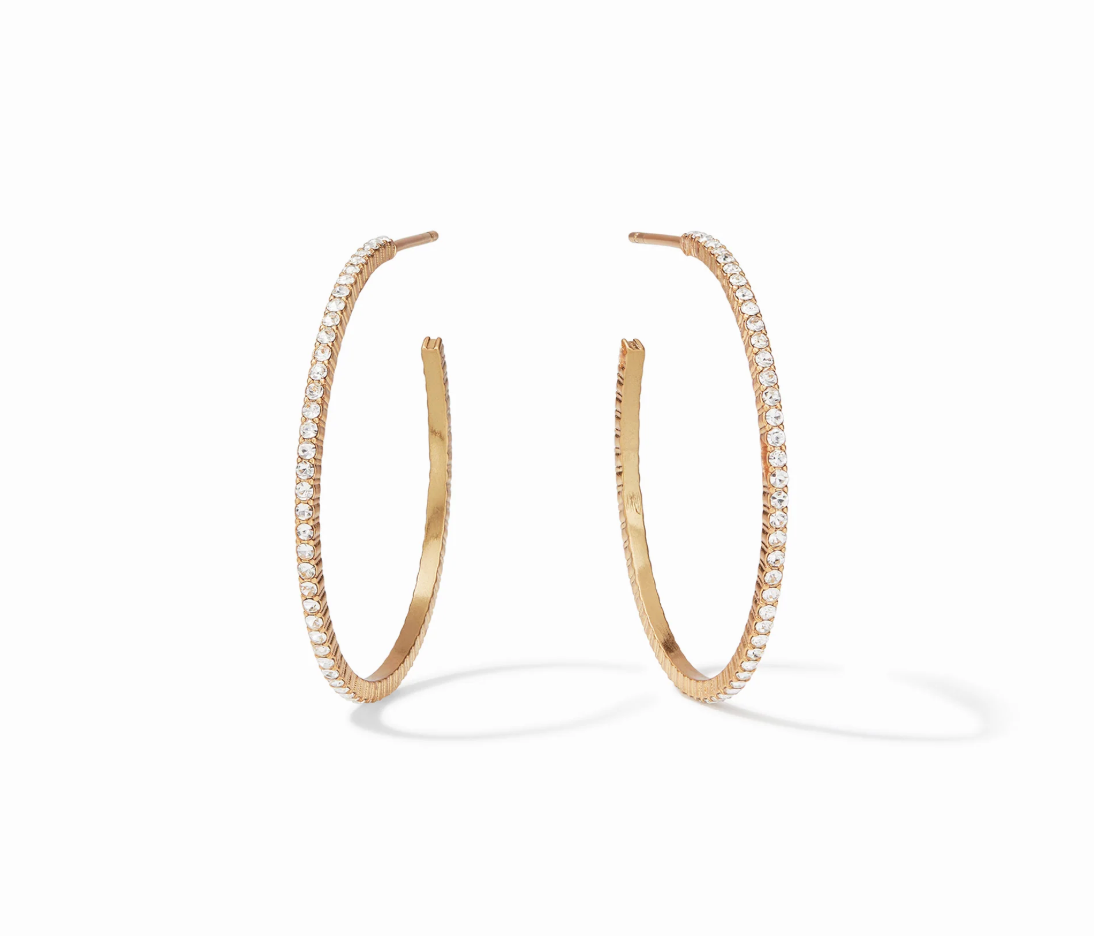 Gold hoop earrings with embedded clear crystals