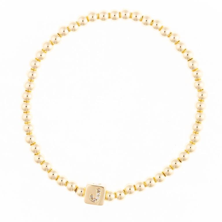 Gold beaded bracelet with a square charm featuring the letter J in crystals