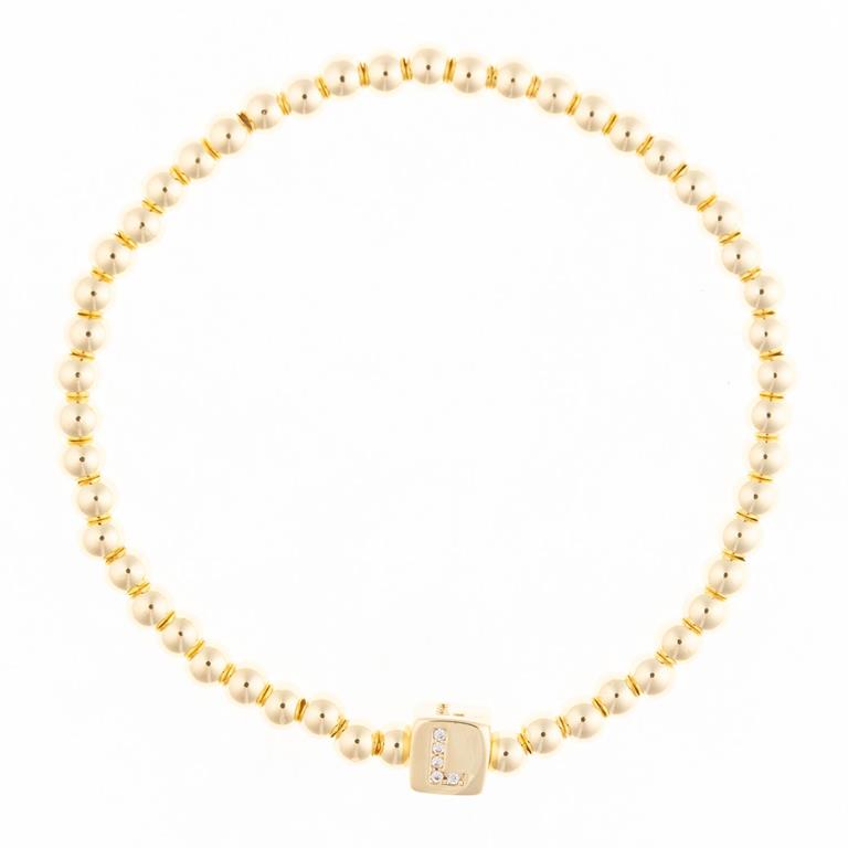 Gold beaded bracelet with a square charm featuring the letter L in diamonds