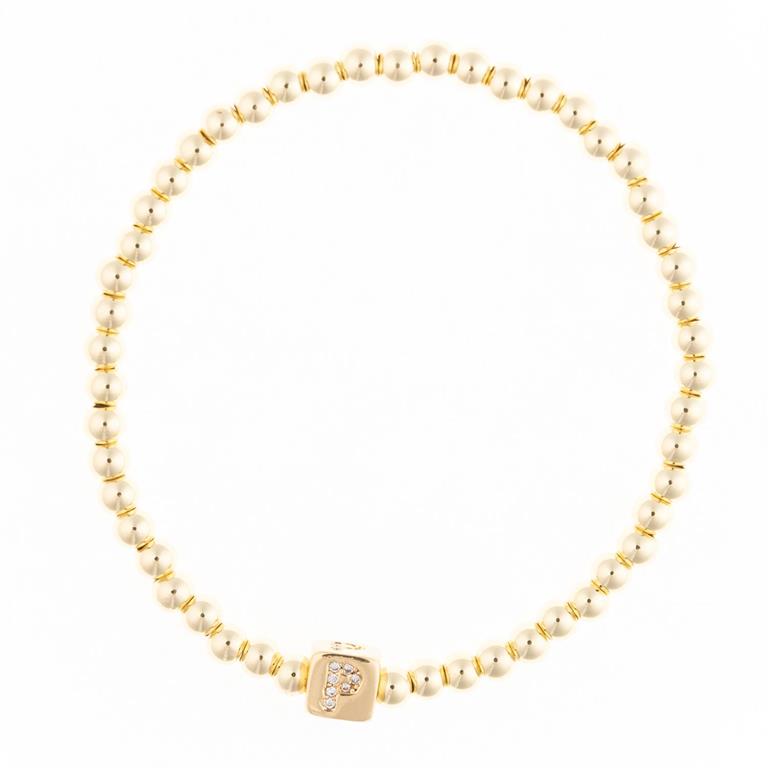Gold beaded stretch bracelet with a square charm featuring the letter P in pavé stones