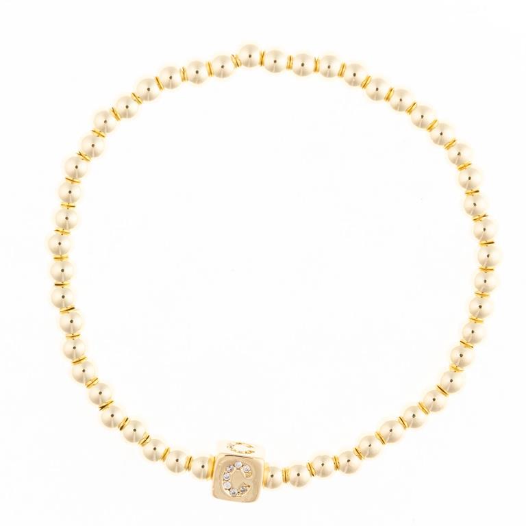 Gold beaded stretch bracelet with a square charm featuring a crystal letter C