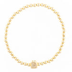 Gold beaded stretch bracelet with a square charm featuring the letter H in crystals